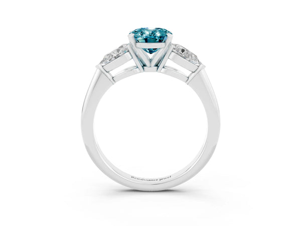 Silver Three-Stone Oval Cut Blue Topaz Ring with Pear Side Stones and Four-Prong Setting