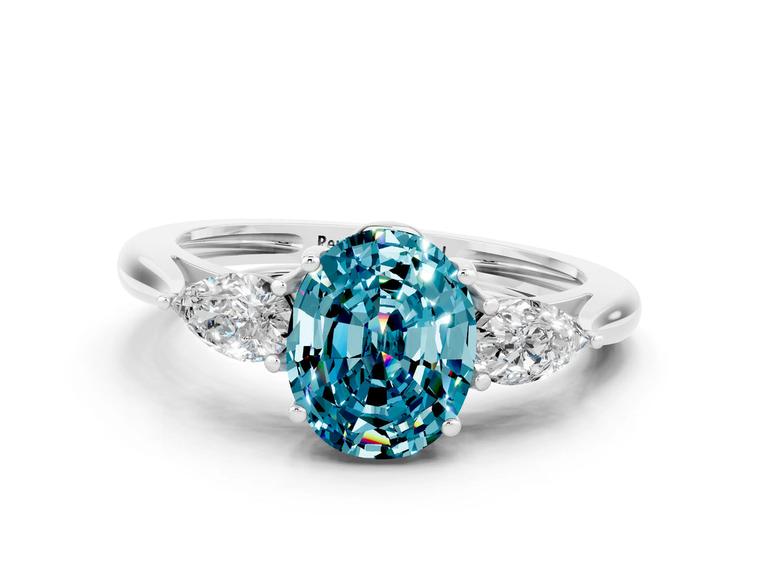 White gold Three-Stone Oval Cut Blue Topaz Ring with Pear  Side Stones in Four-Prong Setting_12