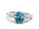 White gold Three-Stone Oval Cut Blue Topaz Ring with Pear  Side Stones in Four-Prong Setting_12