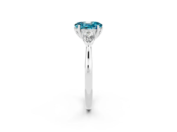 Silver Three-Stone Oval Cut Blue Topaz Ring with Pear  Side Stones in Four-Prong Setting