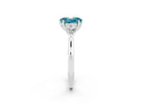 White gold Three-Stone Oval Cut Blue Topaz Ring with Pear  Side Stones in Four-Prong Setting_50