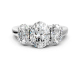 White gold Three-Stone Oval Cut Cut Diamond Ring with Channel Set Band and Four-Prong Setting_50