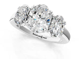 White gold Three-Stone Oval Cut Cut Diamond Ring with Channel Set Band and Four-Prong Setting_51