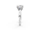 White gold Three-Stone Oval Cut Cut Diamond Ring with Channel Set Band and Four-Prong Setting_52