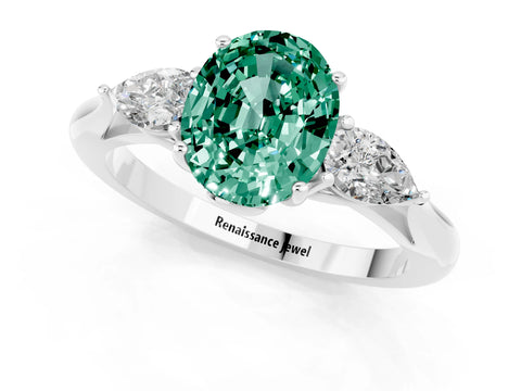 White gold Three-Stone Oval Cut Cut Diamond Ring with Pear Side Stones in Four-Prong Setting_1