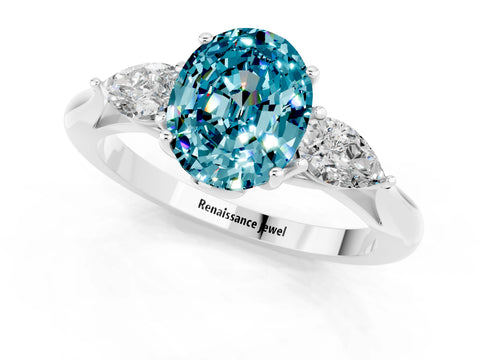 White gold Three-Stone Oval Cut Cut Diamond Ring with Pear Side Stones in Four-Prong Setting_1