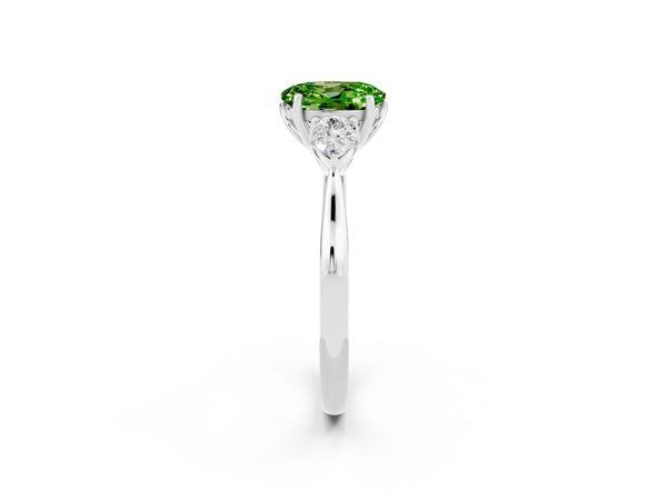 Platinum Three-Stone Oval Cut Cut Diamond Ring with Pear Side Stones in Four-Prong Setting