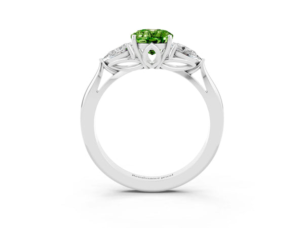 White gold Three-Stone Oval Cut Cut Diamond Ring with Pear Side Stones in Four-Prong Setting