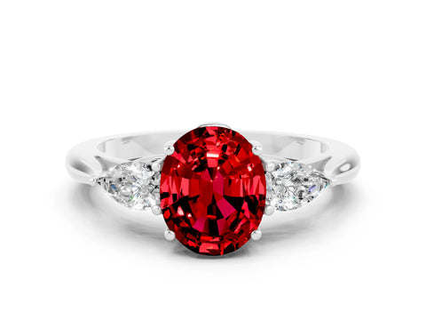 White gold Three-Stone Oval Cut Cut Diamond Ring with Pear Side Stones in Four-Prong Setting