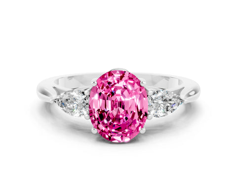 White gold Three-Stone Oval Cut Cut Diamond Ring with Pear Side Stones in Four-Prong Setting
