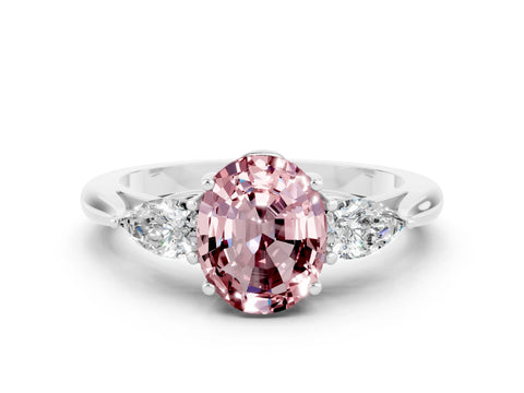 White gold Three-Stone Oval Cut Cut Diamond Ring with Pear Side Stones in Four-Prong Setting