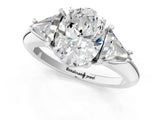 White gold Three-Stone Oval Cut Cut Diamond Ring with Trillion Side Stones and Four-Prong Setting_16