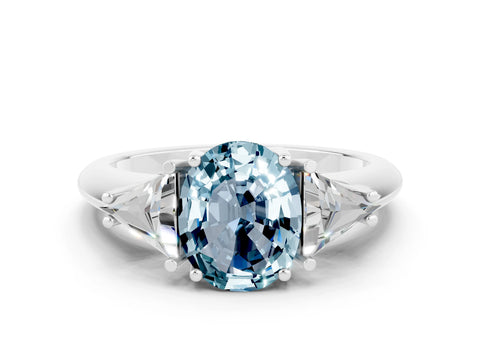 White gold Three-Stone Oval Cut Cut Diamond Ring with Trillion Side Stones and Four-Prong Setting
