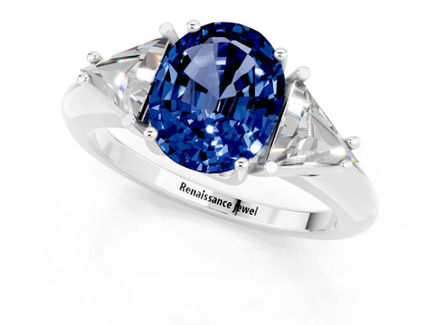 White gold Three-Stone Oval Cut Cut Diamond Ring with Trillion Side Stones and Four-Prong Setting_1
