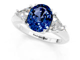 White gold Three-Stone Oval Cut Cut Diamond Ring with Trillion Side Stones and Four-Prong Setting_1