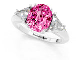 White gold Three-Stone Oval Cut Cut Diamond Ring with Trillion Side Stones and Four-Prong Setting_1