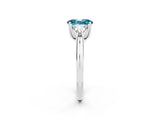 White gold Three-Stone Oval Cut Cut Diamond Ring with Trillion Side Stones and Four-Prong Setting_2