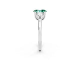 White gold Three-Stone Oval Cut Cut Diamond Ring with Trillion Side Stones and Four-Prong Setting_2