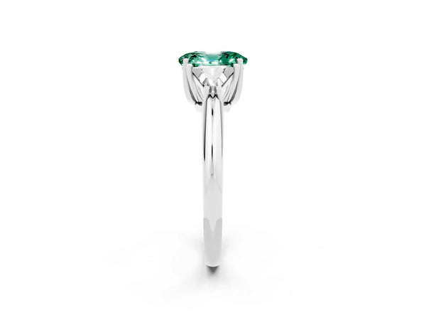 Silver Three-Stone Oval Cut Green Sapphire Engagement Ring with Trillion Side Stones and Prong Setting