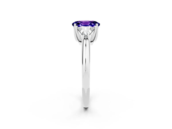 White gold Three-Stone Oval Cut Tanzanite Engagement Ring with Trillion Side Stones and Prong Setting