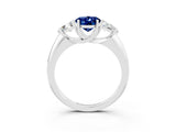 White gold Three-Stone Oval Cut Cut Diamond Ring with Trillion Side Stones and Four-Prong Setting_3