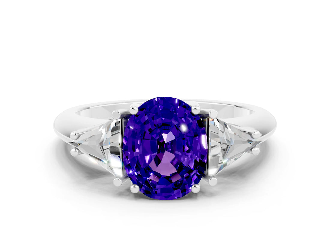 White gold Three-Stone Oval Cut Cut Diamond Ring with Trillion Side Stones and Four-Prong Setting