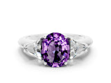 White gold Three-Stone Oval Cut Cut Diamond Ring with Trillion Side Stones and Four-Prong Setting