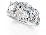 White gold Three-Stone Oval Cut Diamond Ring with Channel-Set Band and Four-Prong Setting_53