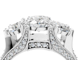 White gold Three-Stone Oval Cut Diamond Ring with Channel-Set Band and Four-Prong Setting_56