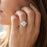 White gold Three-Stone Oval Cut Diamond Ring with Channel Set Band and Four-Prong Setting_8