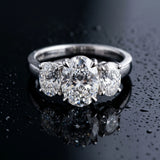 White gold Three-Stone Oval Cut Diamond Ring with Channel Set Band and Four-Prong Setting_9