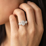 White gold Three-Stone Oval Cut Diamond Ring with Round Accent Stones, Prong Setting, and Classic Band_67