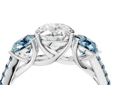 White gold Three-Stone Oval Cut Diamond Ring with Round with Aquamarine side stone Pavé Band and Prong Setting_16