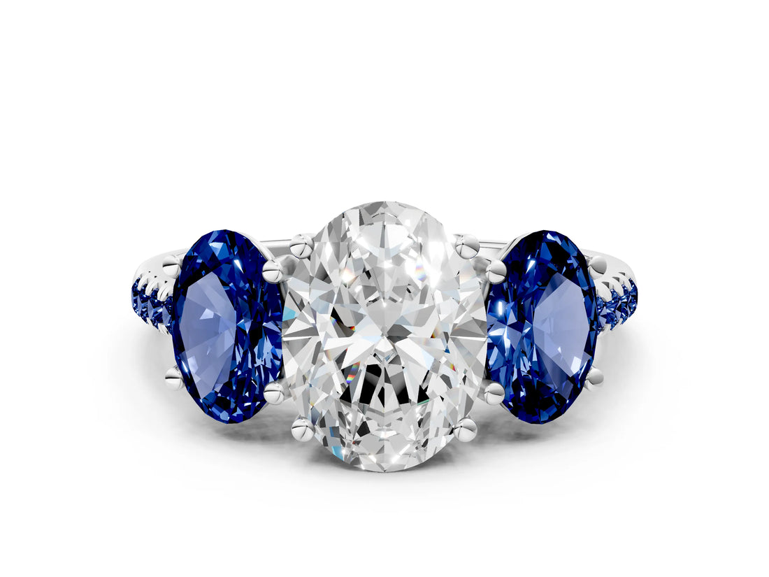 White gold Three-Stone Oval Cut Diamond Ring with Round with Blue Sapphire side stone Pavé Band and Prong Setting_12