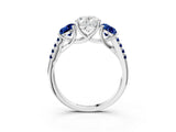White gold Three-Stone Oval Cut Diamond Ring with Round with Blue Sapphire side stone Pavé Band and Prong Setting_15