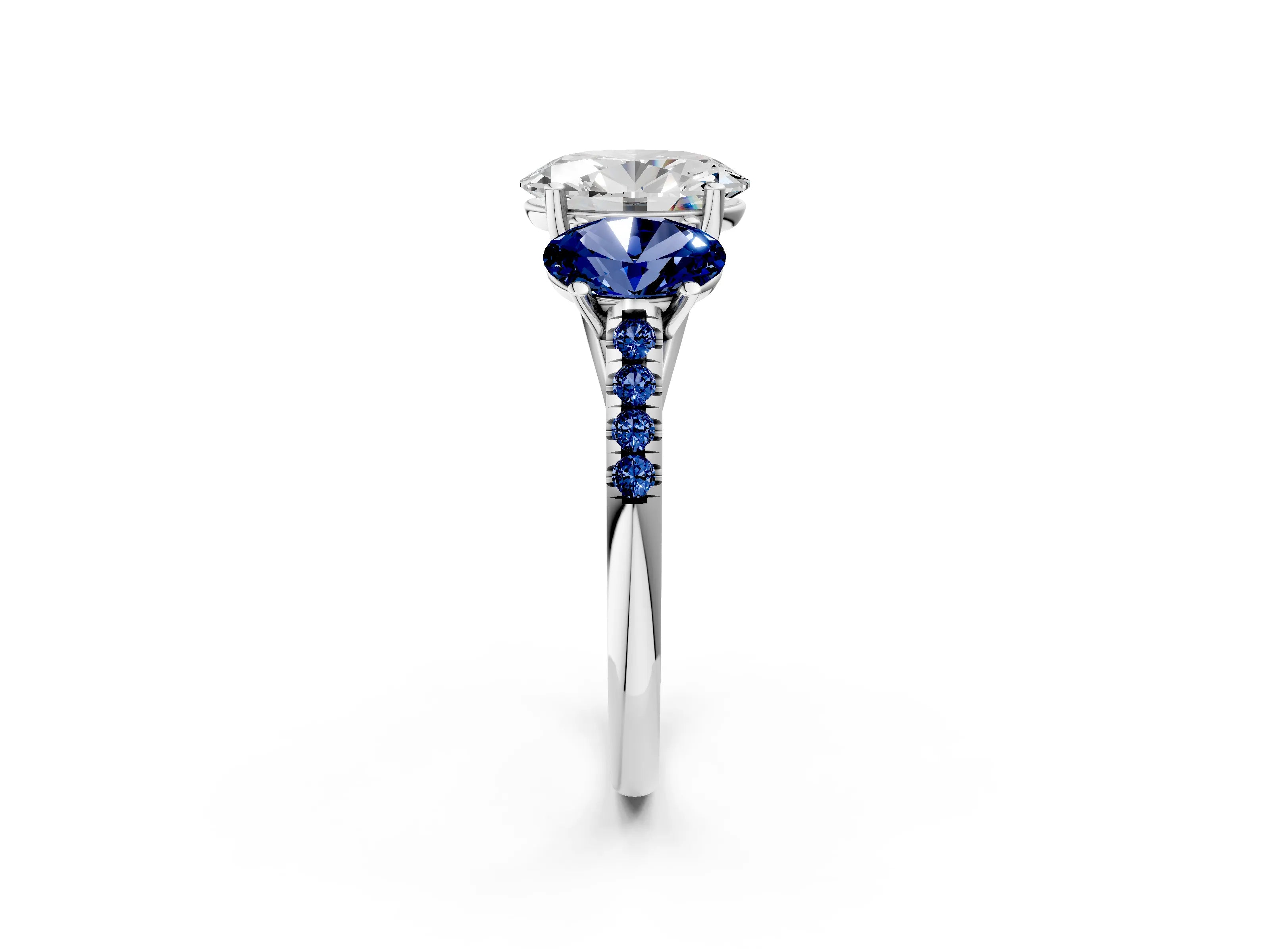 White gold Three-Stone Oval Cut Diamond Ring with Round with Blue Sapphire side stone Pavé Band and Prong Setting_2