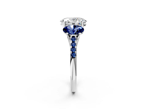 White gold Three-Stone Oval Cut Diamond Ring with Round with Blue Sapphire side stone Pavé Band and Prong Setting_2
