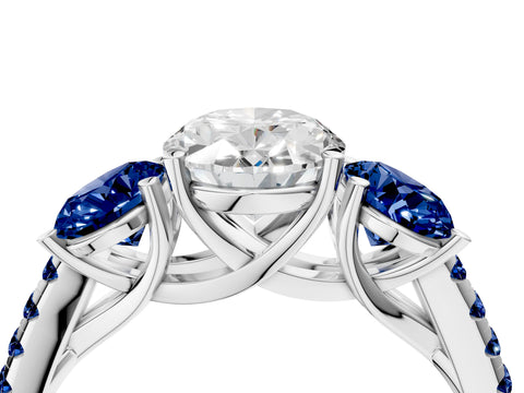White gold Three-Stone Oval Cut Diamond Ring with Round with Blue Sapphire side stone Pavé Band and Prong Setting_4