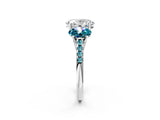 White gold Three-Stone Oval Cut Diamond Ring with Round with Blue Topaz side stone Pavé Band and Prong Setting_2