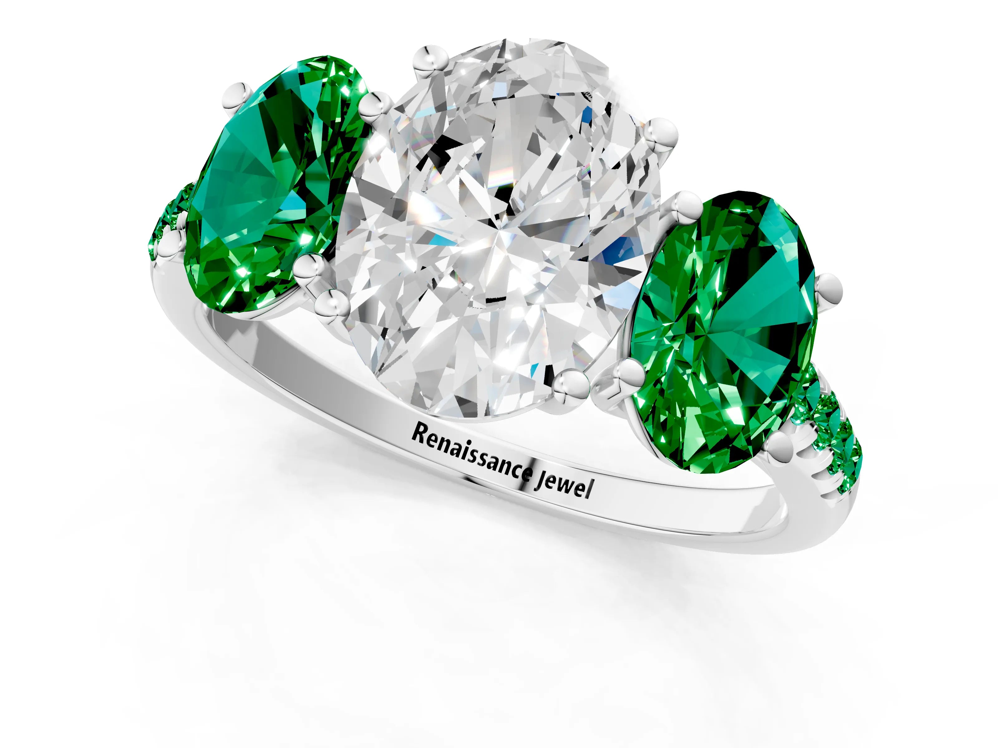 White gold Three-Stone Oval Cut Diamond Ring with Round with Emerald side stone Pavé Band and Prong Setting_1