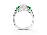 White gold Three-Stone Oval Cut Diamond Ring with Round with Emerald side stone Pavé Band and Prong Setting_3