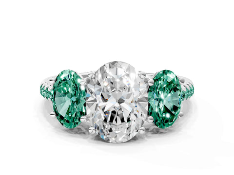 White gold Three-Stone Oval Cut Diamond Ring with Round with Green Sapphire side stone Pavé Band and Prong Setting