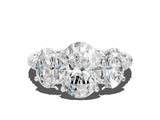 White gold Three-Stone Oval Cut Diamond Ring with Round with Moissanite side stone Pavé Band and Prong Setting