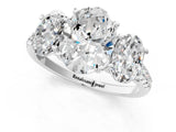 White gold Three-Stone Oval Cut Diamond Ring with Round with Moissanite side stone Pavé Band and Prong Setting_1
