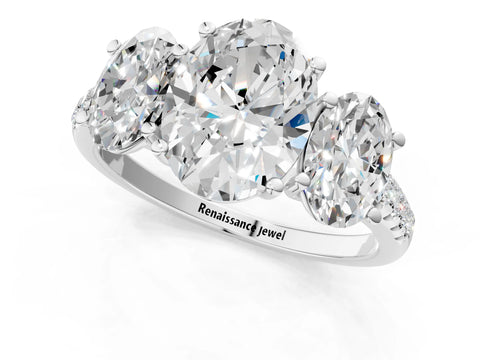 White gold Three-Stone Oval Cut Diamond Ring with Round with Moissanite side stone Pavé Band and Prong Setting_1