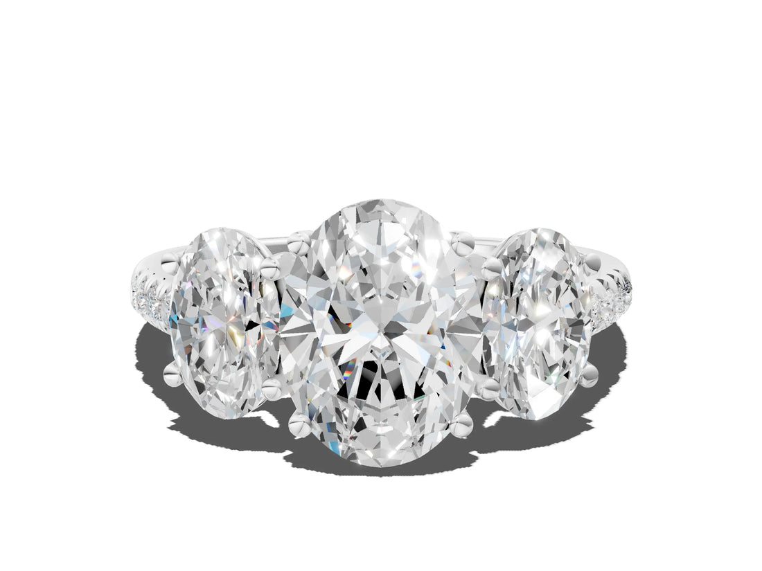 White gold Three-Stone Oval Cut Diamond Ring with Round with Moissanite side stone Pavé Band and Prong Setting
