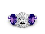 White gold Three-Stone Oval Cut Diamond Ring with Round with Tanzanite side stone Pavé Band and Prong Setting