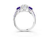 White gold Three-Stone Oval Cut Diamond Ring with Round with Tanzanite side stone Pavé Band and Prong Setting_3