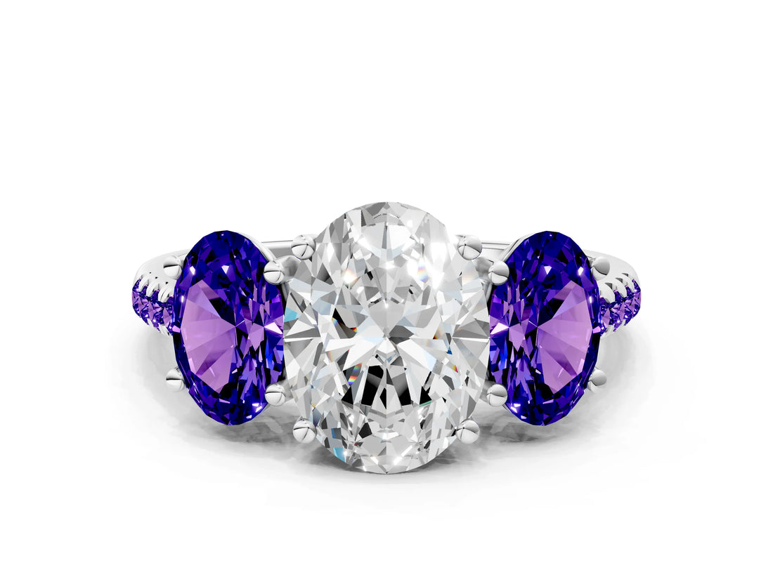 White gold Three-Stone Oval Cut Diamond Ring with Round with Tanzanite side stone Pavé Band and Prong Setting