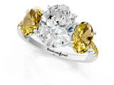 White gold Three-Stone Oval Cut Diamond Ring with Round with Yellow Sapphire side stone Pavé Band and Prong Setting_1